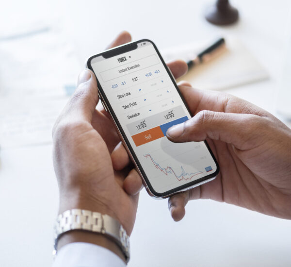 Businessman checking stock market online